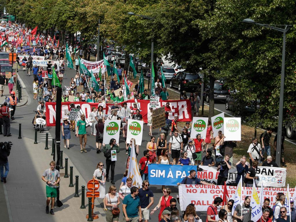 Anti-Trump Protest Highlights Democracy Concerns Ahead of NATO Meeting in Brussels